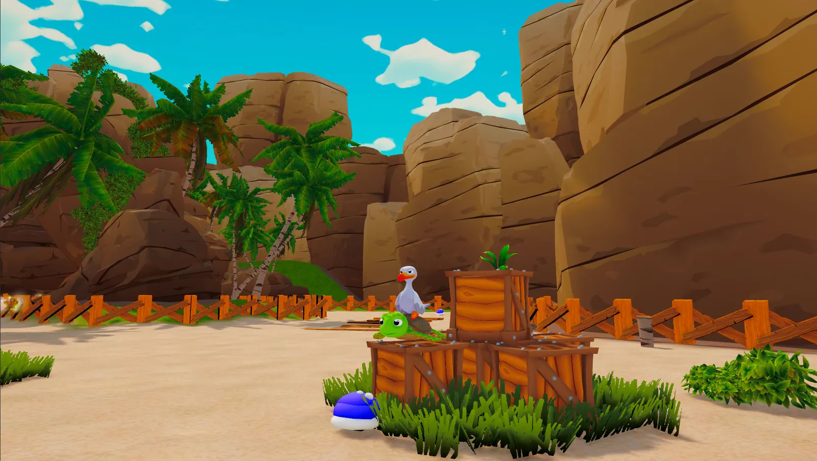 Out of Water in game screenshot: the seagull and turtle sitting on a pile of crates in an open beach level, surrounded by sand, palm trees and rocky cliffs