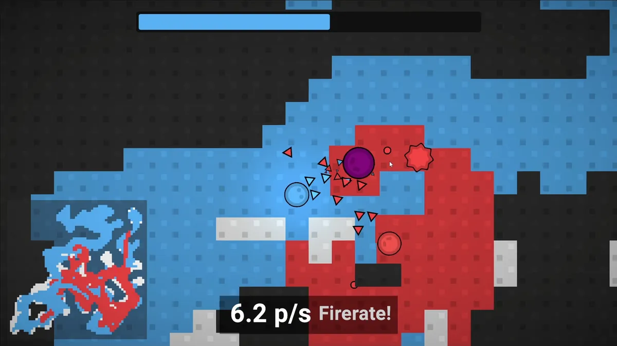Tile Turfer late in a match: heavy territory control with dense enemy presence and upgraded attack patterns